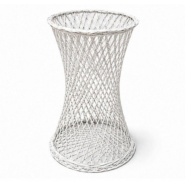 A striking Mid-Century Modern spun fiberglass pedestal stand in the style of Russell Woodard. Featuring the iconic...