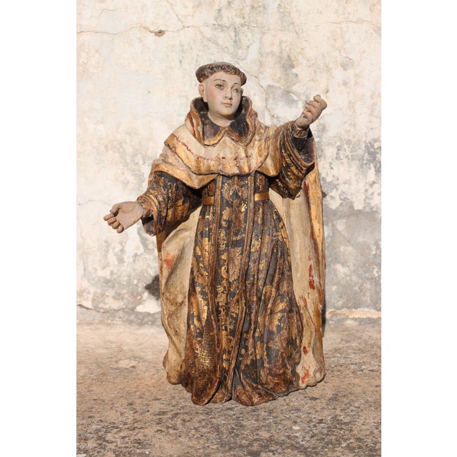 Date: 18th Century. Country: Portugal. Material: Polychrome Wood, Glass Eyes. Item condition: Some flaws and cracks along...