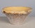 An early 20th century Country French yellow glazed earthenware pottery tian or grésale bowl. Originating from Provence and...