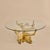 A 1970s Belgian coffee table by Willy Daro, defined by its sculptural brass base shaped like a bonsai tree. A round glass...