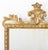 Louis XVI Style Giltwood Mirror, 19th century, with shield and scroll form crest with carved floral border. Mirror plate:...