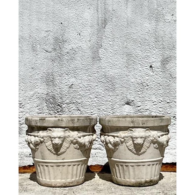 Elevate your garden with these Vintage Regency Cast Concrete Lions Head Planters. Featuring majestic lion heads and...