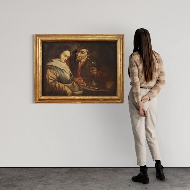 Antique Flemish painting from the 18th century. Framework oil on canvas depicting an interior scene of a tavern with...