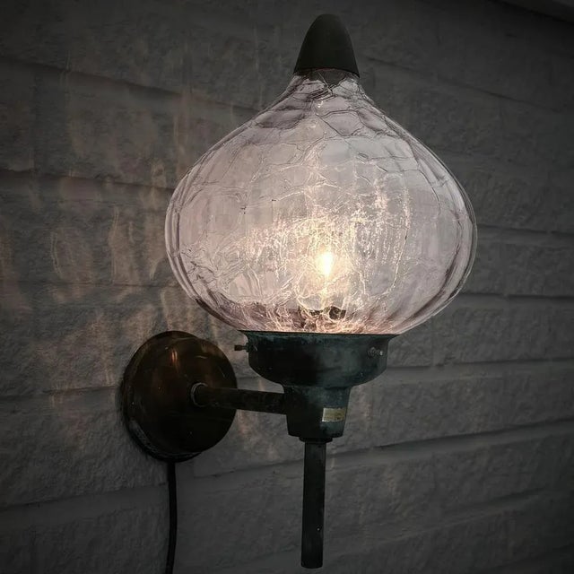 An organically shaped Scandinavian outdoor facade lamp, model 283, produced by the Swedish lighting manufacturer Westal in...