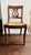 Created in the traditional Duncan Phyfe Lyre style, this unique mahogany chair has beautiful curved legs and woven rush...