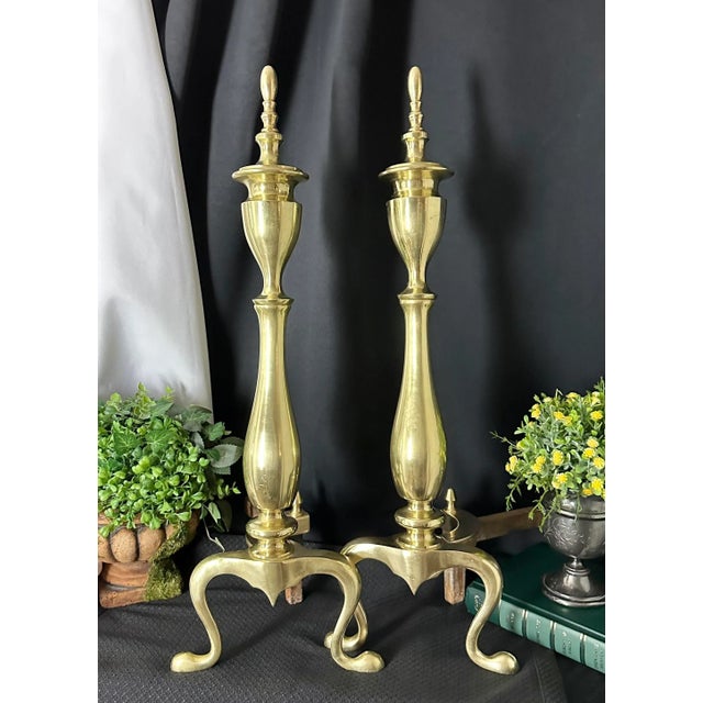 This is for a pair Vintage Federal styled solid brass andirons with cast iron leg. This pair measures: 22 inches tall and...