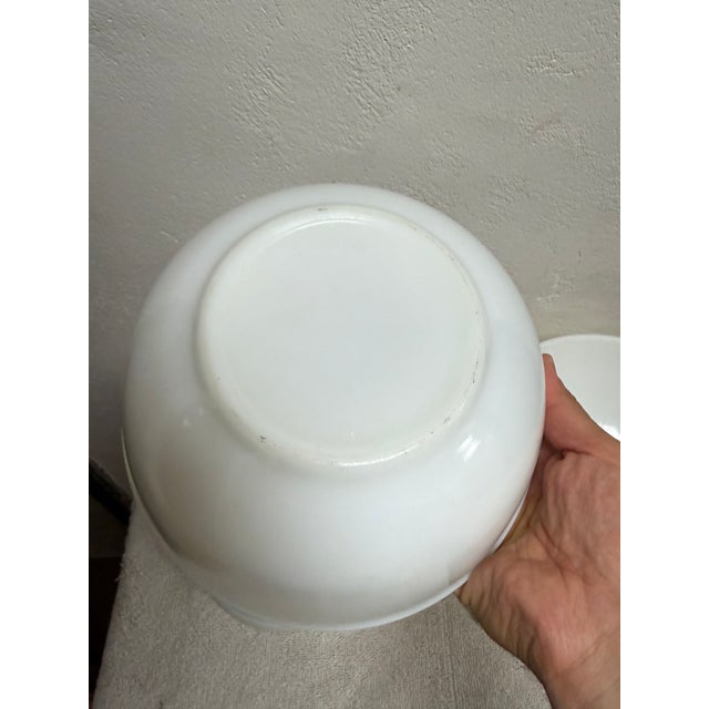 Pyrex (attributed) True Opal white milk glass mixing bowls that date to around 1950’s. The bottom of the bowls are marked...