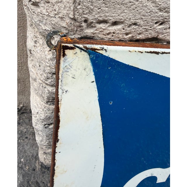 Vintage enameled metal sign of the famous Campari brand, dating back to the 1970s. Classic design with a deep blue...