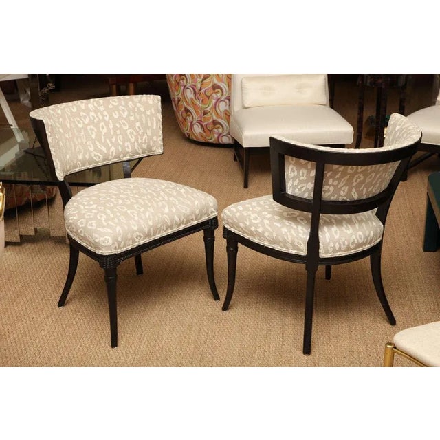 This lovely pair of fully restored vintage Grosfeld House Regency style side chairs have an unusual beaded wood detail,...