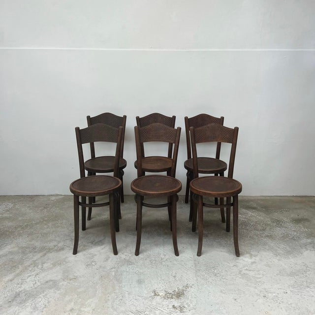 Antique Bentwood Bistro Chairs from Mundus, 1890s, Set of 6, in Worn conditions. Designed 1890 to 1919 This piece is...