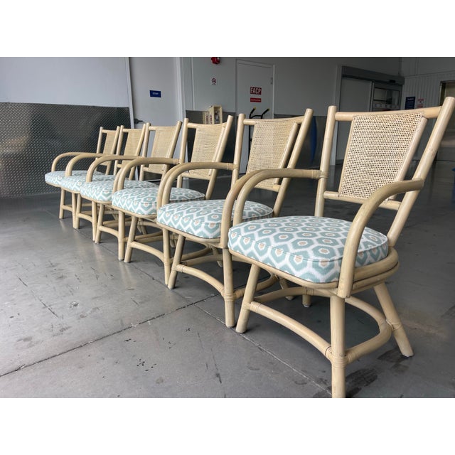 Contemporary Vintage Organic Modern Rattan Swivel Dining Chairs With Arms and Cane Backs – Set of 6 For Sale - Image 3 of 17
