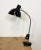 Industrial bakelite flexible gooseneck table lamp made in Germany during the 1950s .Very good vintage condition. The...