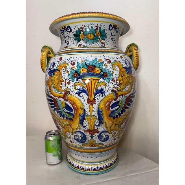 This monumental antique handmade Italian majolica, painted terracotta vase is a unique and exquisite piece of European...