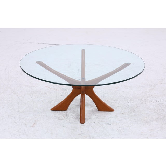 Original Danish coffee table, model T118, by Illum Wikkelsø for Niels Eilersen. Sculptural, star-shaped base made of solid...