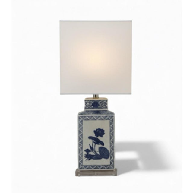 This is an exquisite, substantial vintage or antique style table lamp featuring a stunning blue and white porcelain base....