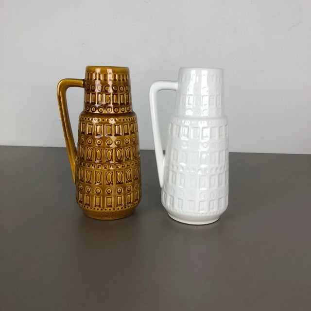 Set of two fat lava art vases Producer: Scheurich, Germany Design: Nr. 416 26 Decade: 1970s This original vintage Vase was...