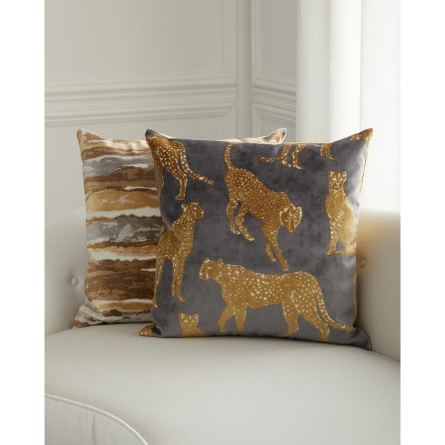 - Gold and slate - Bold striking leopard animique patterned - Handcrafted - Feather down inserts - Rayon and polyester...