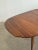 W54.5 - W66.5 D42 H30 KC24 Leaf W12 This minimalistic dining table features dainty gently tapered legs, a walnut top with...