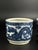 A fine and authentic pair of blue and white porcelain brush pots (bitong), hand-painted with a continuous design of...