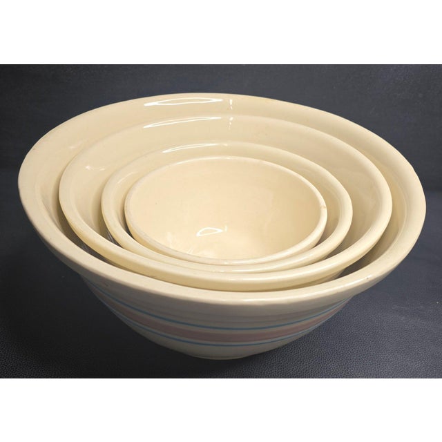 Mid-Century Modern Complete Four Piece Set of Vintage Nelson McCoy Stonecraft Nesting Mixing Bowls With Pink and Blue Stripes For Sale - Image 3 of 11