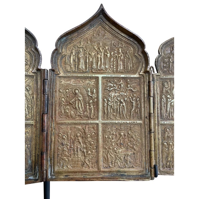 Bronze icon with various religious scenes. Russian Orthodox iconography has long played a role as a medium to focus for...