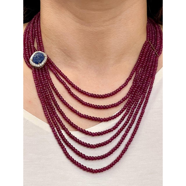 Approximately 480 Ct 7 Layer Smooth Natural Ruby Bead Necklace with 14 Karat Gold Clasp and carved sapphire and diamond...