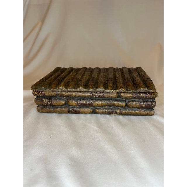 Great resin box covered with faux cigars. Imagine this in your study!! The cigar bands are burgundy and the cigars...