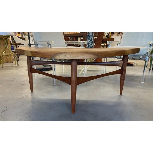 A stunning Scandinavian exotic wood guitar pick shaped cocktail table. Beautifully made with mortise and tenon detail and...
