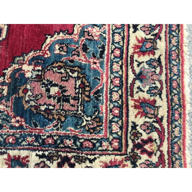 Beautiful late 19th century rug with a central medallion design and beautiful natural colors with blue, red and pink,...