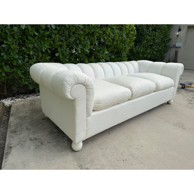 Vintage American Postmodern sofa by Fine Arts Furniture of New York, featuring a sculptural channel-back form, generously...