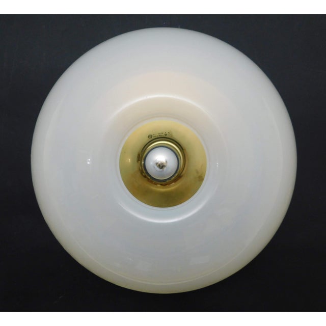 Vintage Italian flush mount or wall light with frosted donut shaped plexiglass shade / Made in Italy by iGuzzini, circa...