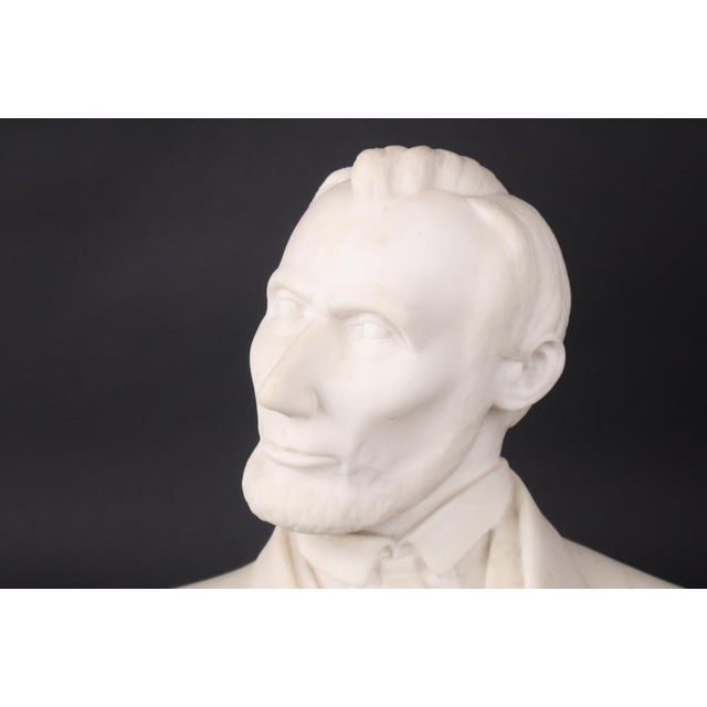 An exquisitely executed and nicely proportioned early 20th century marble bust of Abraham Lincoln, the American lawyer,...