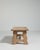 A solid oak coffee table reflecting the practical, material-focused design of the 1970s, where European furniture...