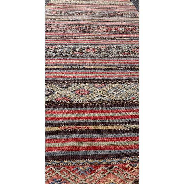 Vintage Turkish Kilim With Horizontal Stripes and Tribal Motifs in Bright Tones For Sale - Image 4 of 11