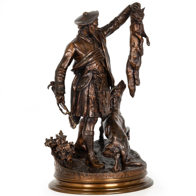 PIERRE-JULES MÊNE French, 1810-1879 Group of a Scottish Hunter with Fox and Hound (1861) Sand-cast patinated bronze,...