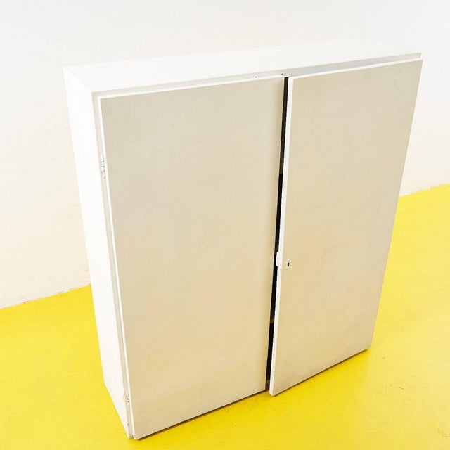 Discover the charm of this elegant vintage white wooden wardrobe, perfect for those who love the art of retro decor. With...