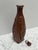 Vintage rustic handmade bottle, bud vase or vessel. Rugged hand carved flowers with a primitive simplistic design in a...
