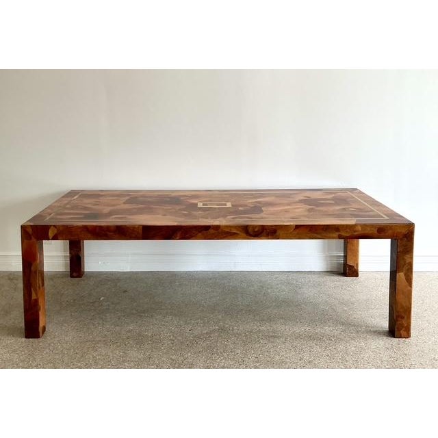 This exceptional 1970s dining table is a masterclass in texture and geometric precision. Featuring a stunning patchwork of...