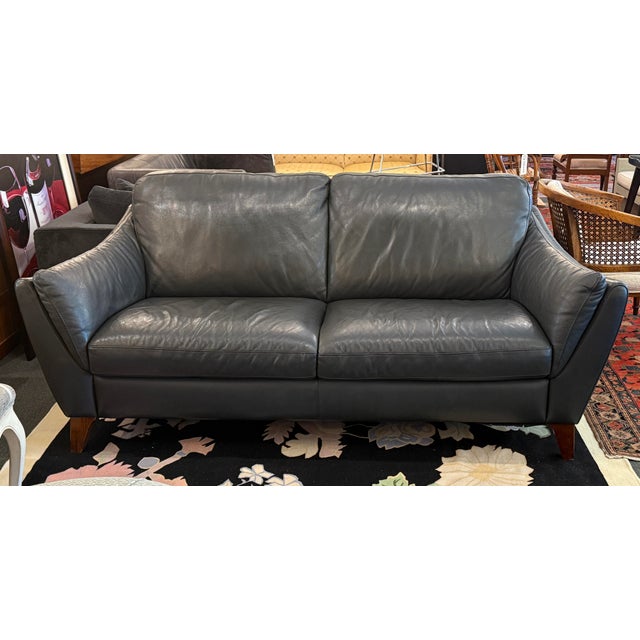 Design Plus Gallery presents the Greccio Leather Sofa from Natuzzi Editions Collection. The sofa is a nice black leather...