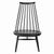 The famous Mademoiselle armchair was designed in 1956 by Finnish designer Ilmari Tapiovaara for the Artek brand. The...