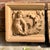 Antique late 19th century tri-parte tan terracotta facade plaque having a mythological cheurubic theme. Provenance:NYC...