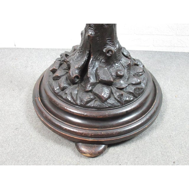 Beautiful wooden hanging sculpture depicting tree with 2 cherub angels climbing and bunch of grapes. Completely hand...