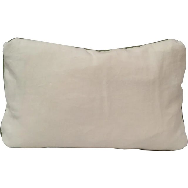 This pillow is made from a lightweight thai silk from Jim Thompson with colorful stripes alternated with a vivid green. A...