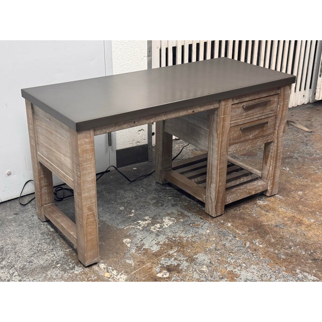 Design Plus Gallery presents the Vaughn Desk from Restoration Hardware Teen. The grey-washed wood frame supports a framed...