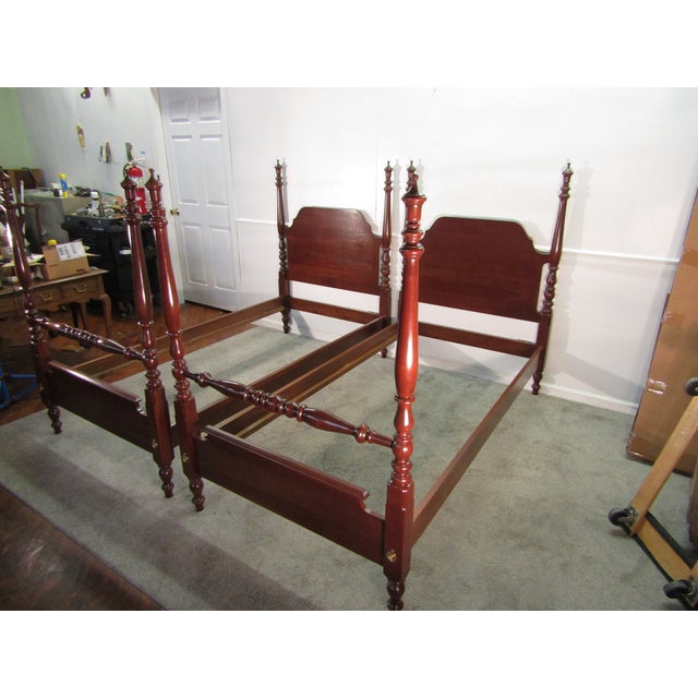 Item 87870: Colonial Furniture solid cherry pair of twin poster beds. Age: 1980's. Details: Come with siderails and center...