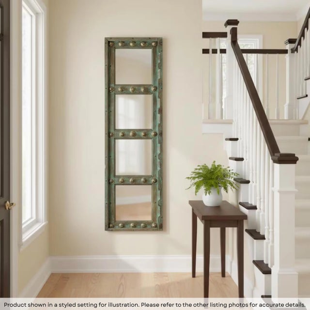 Dimensions: 19" W x 3" D x 65" H Add timeless character to your home with this Distressed Blue Green Wall Mirror,...