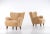 Excellent condition. Newly reupholstered in honey colored sheepskin. This piece is attributed to the mentioned...