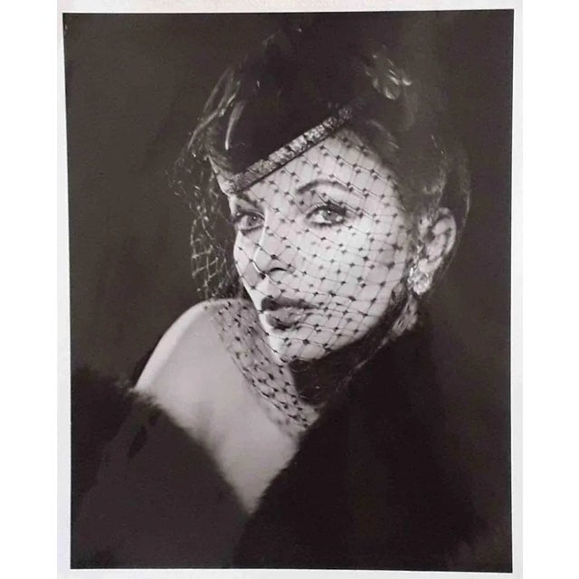 Pair of vintage b/w photographs realized by George Hurrel in 1980s. Excellent condition. This piece is attributed to the...