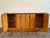 It has a handsome architectural presence and a warm, honey-toned wood finish. The beautifully figured veneer gives the...