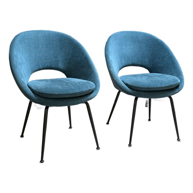 Design Plus Gallery presents a Pair of Orb Dining Chairs from West Elm. These chairs are a modern seating option that is...